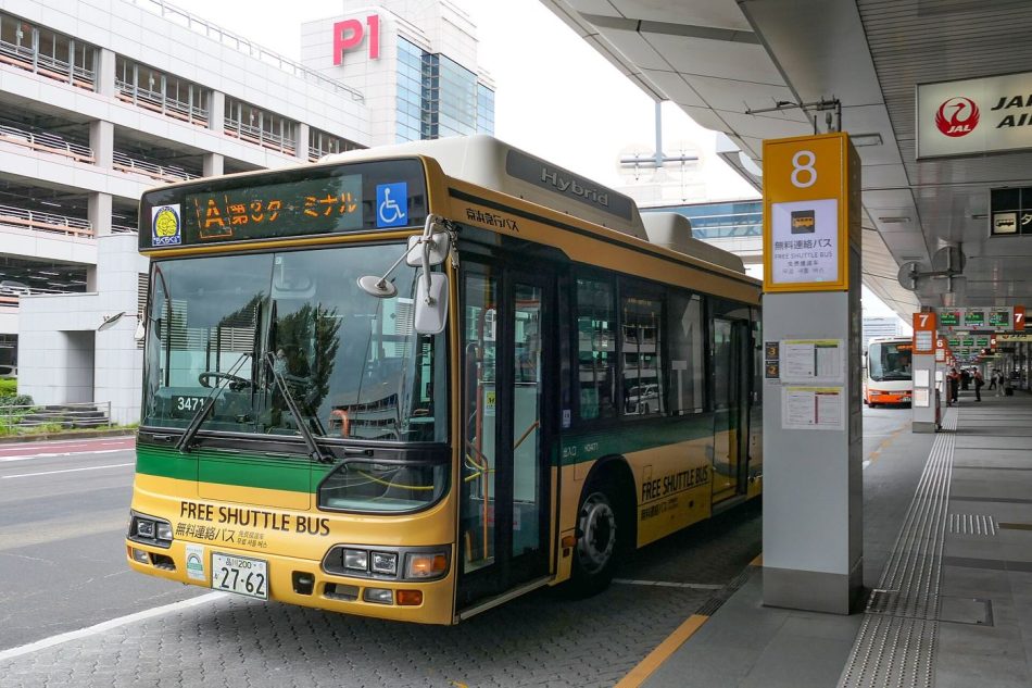 airport shuttle bus outside a terminal