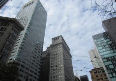 Looking up at skyscrapers in a financial district