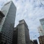 Looking up at skyscrapers in a financial district