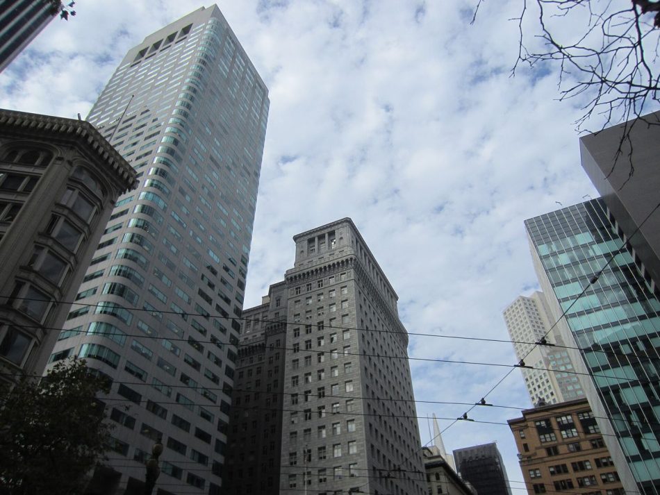 Looking up at skyscrapers in a financial district