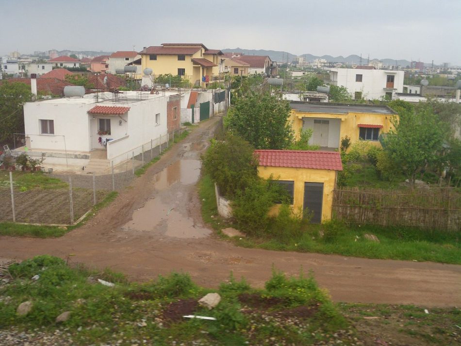 A row of residential houses on a quiet street